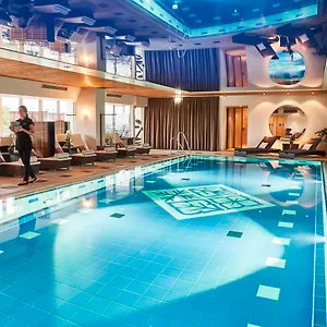 Отель Vier Jahreszeiten Kempinski